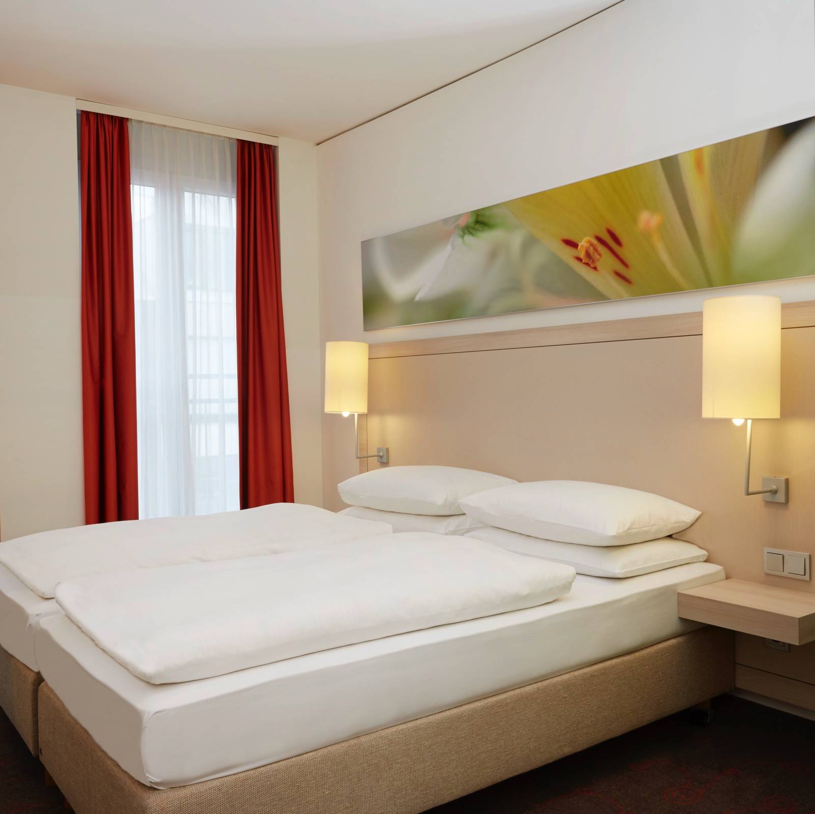 Номера -  H+ Hotel München