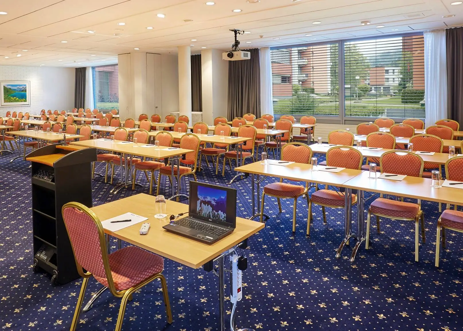 Meeting room with parliamentary seating at the H+ Hotel & Spa Engelberg