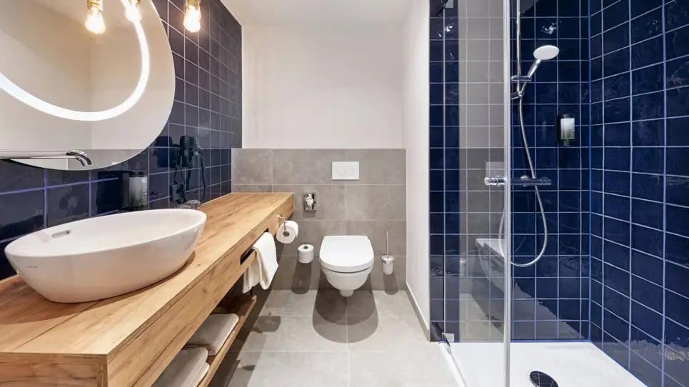 Habitación twin confort cuarto de baño - H2 Hotel Düsseldorf City