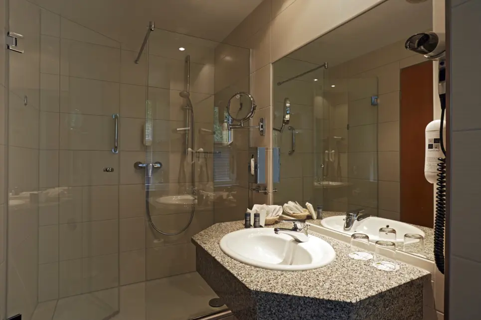 Bathroom at the H+ Hotel & Spa Friedrichroda - Official website