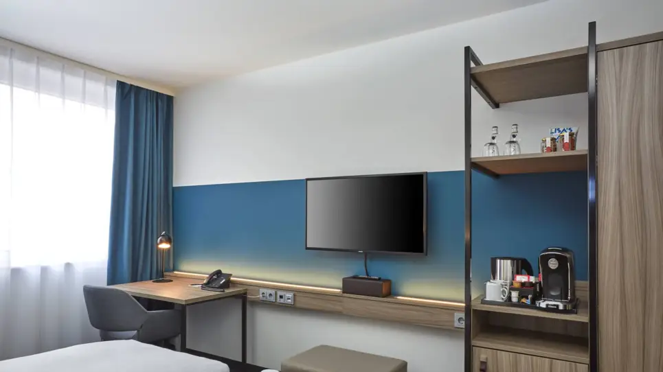 Comfort twin room at the H4 Hotel Leipzig - Official website