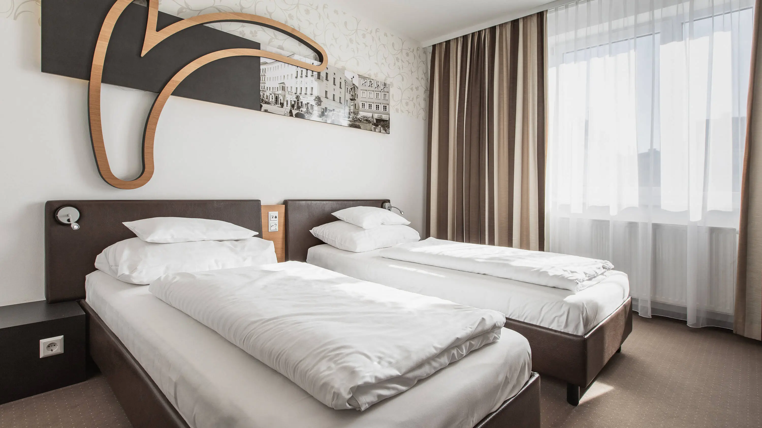 Camere d'albergo confortevoli - H+ Hotel Ried