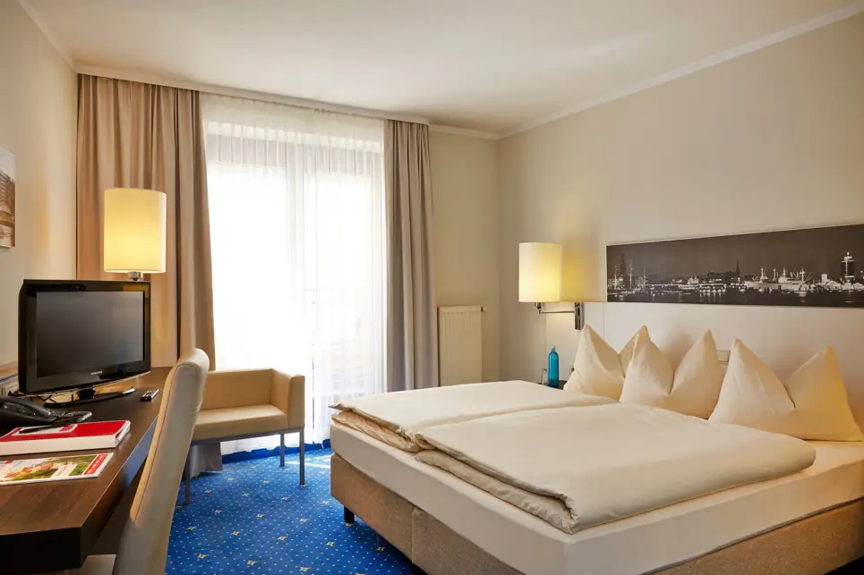 Businesszimmer im H4 Hotel Hamburg Bergedorf - Offizielle Webseite
