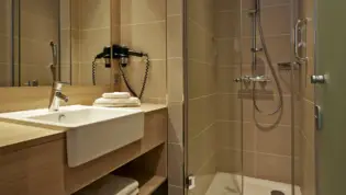 Bathroom at the H2 Hotel München Messe - Official website