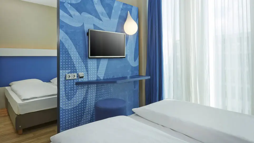 A comfortable hotel room at the H2 Hotel München Messe - Official website