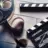 Detailaufnahme von einer Filmrolle und einer Filmklappe.