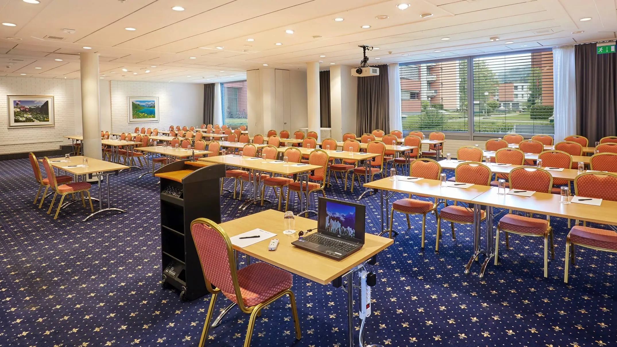 Meeting room with parliamentary seating at the H+ Hotel & Spa Engelberg