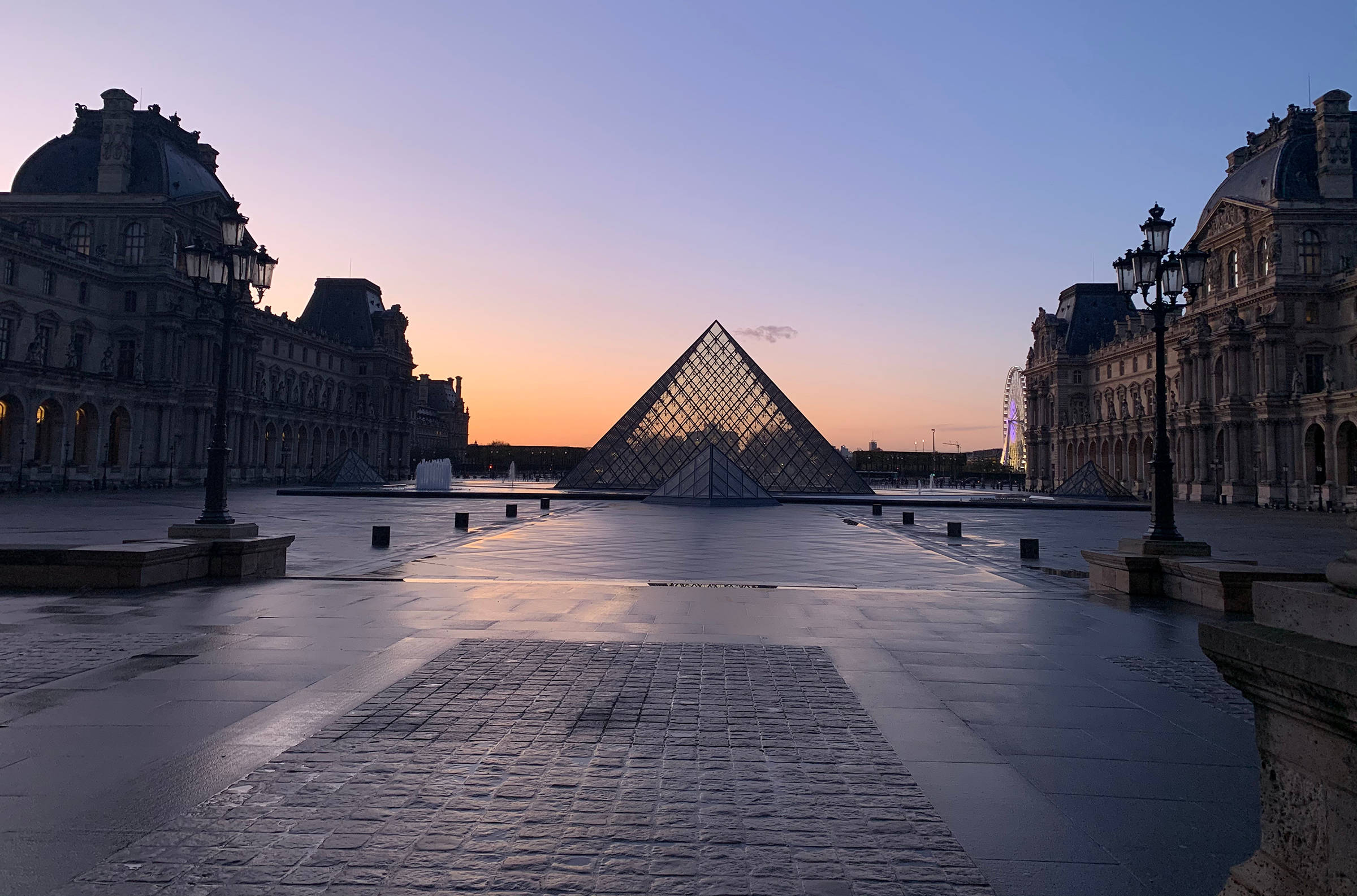 Louis Vuitton Lands a Spaceship on the Louvre