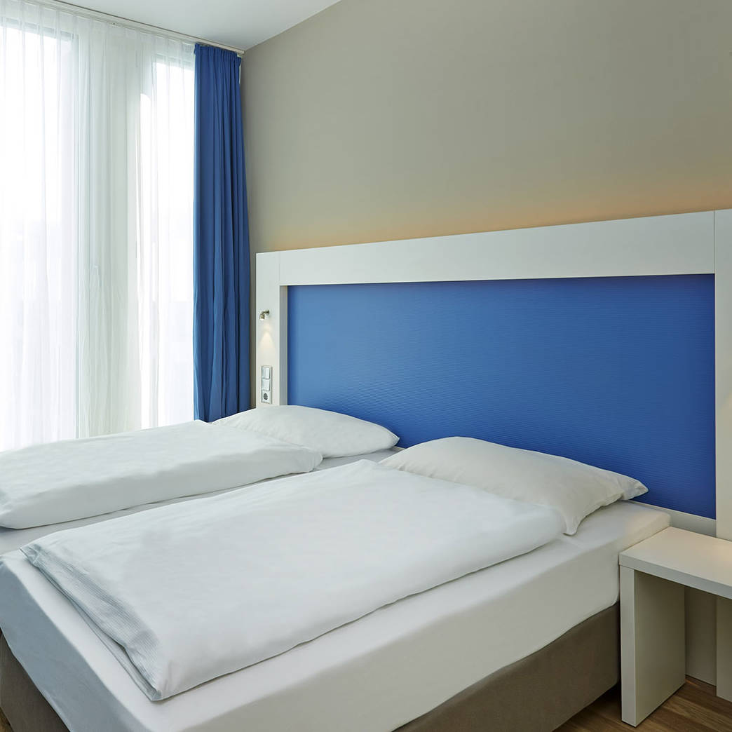 Lichte inrichting H2 Hotel München Messe