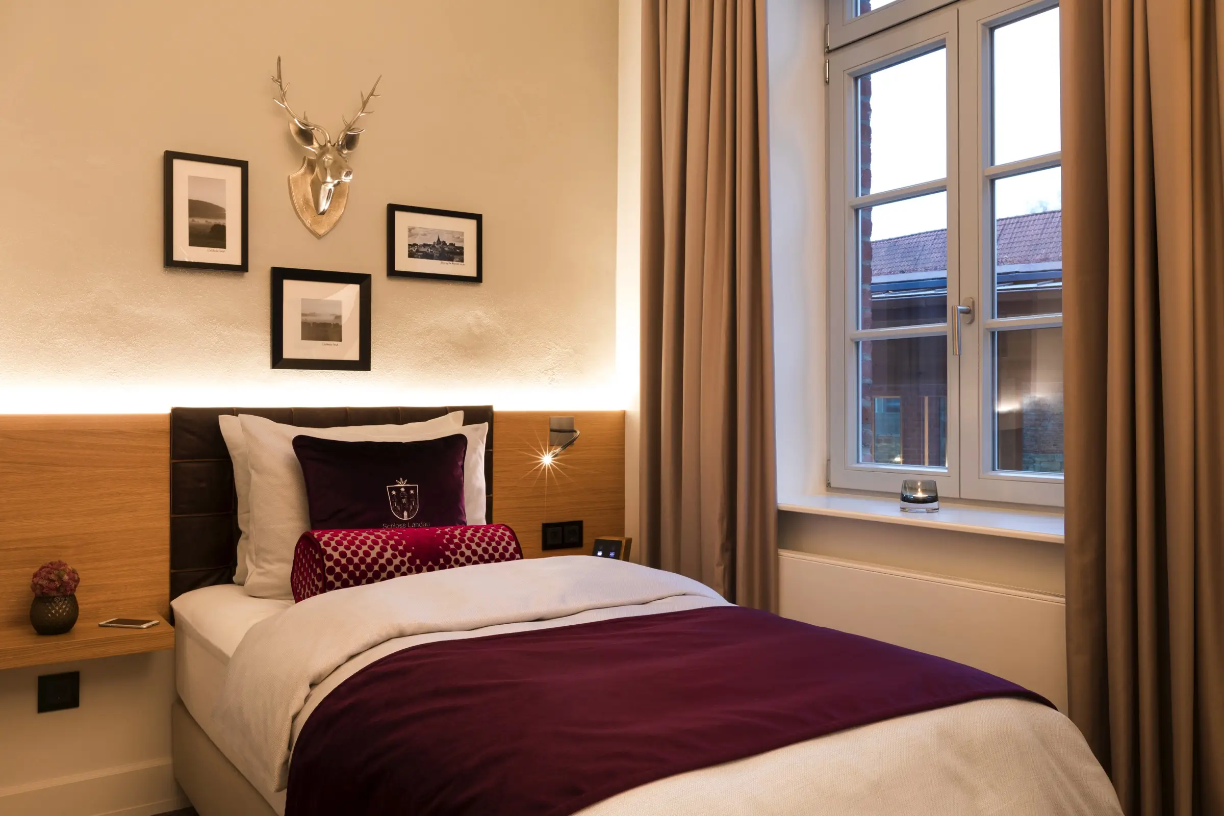 Gemütliches Einzelzimmer im Hotel Brunnenhaus Schloss Landau - Offizielle Webseite
