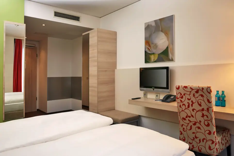 Habitación Queen Confort - H+ Hotel München