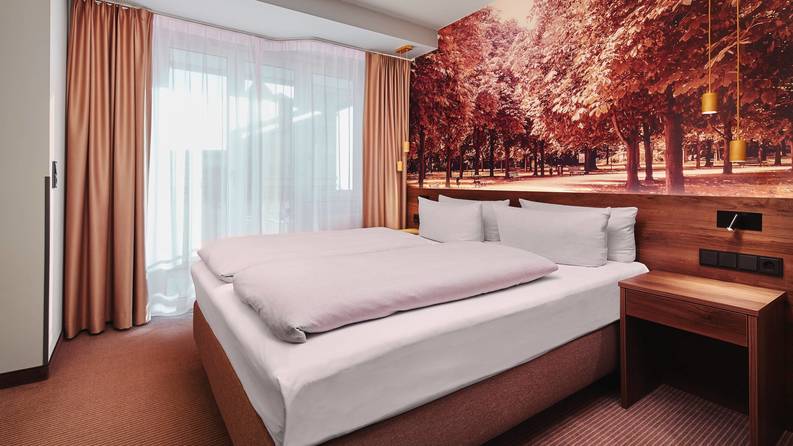 A light hotelroom at the Hyperion Hotel Berlin - Official website