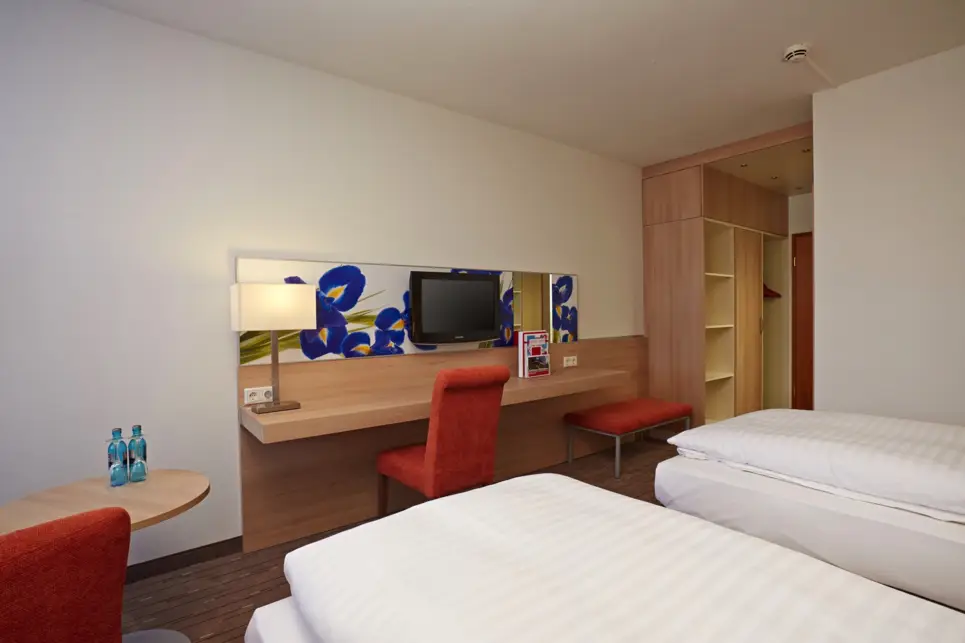 Spacious hotel room at the H+ Hotel Wiesbaden Niedernhausen - Official website