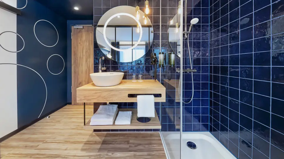 Habitación doble Confort cuarto de baño - H2 Hotel Düsseldorf city