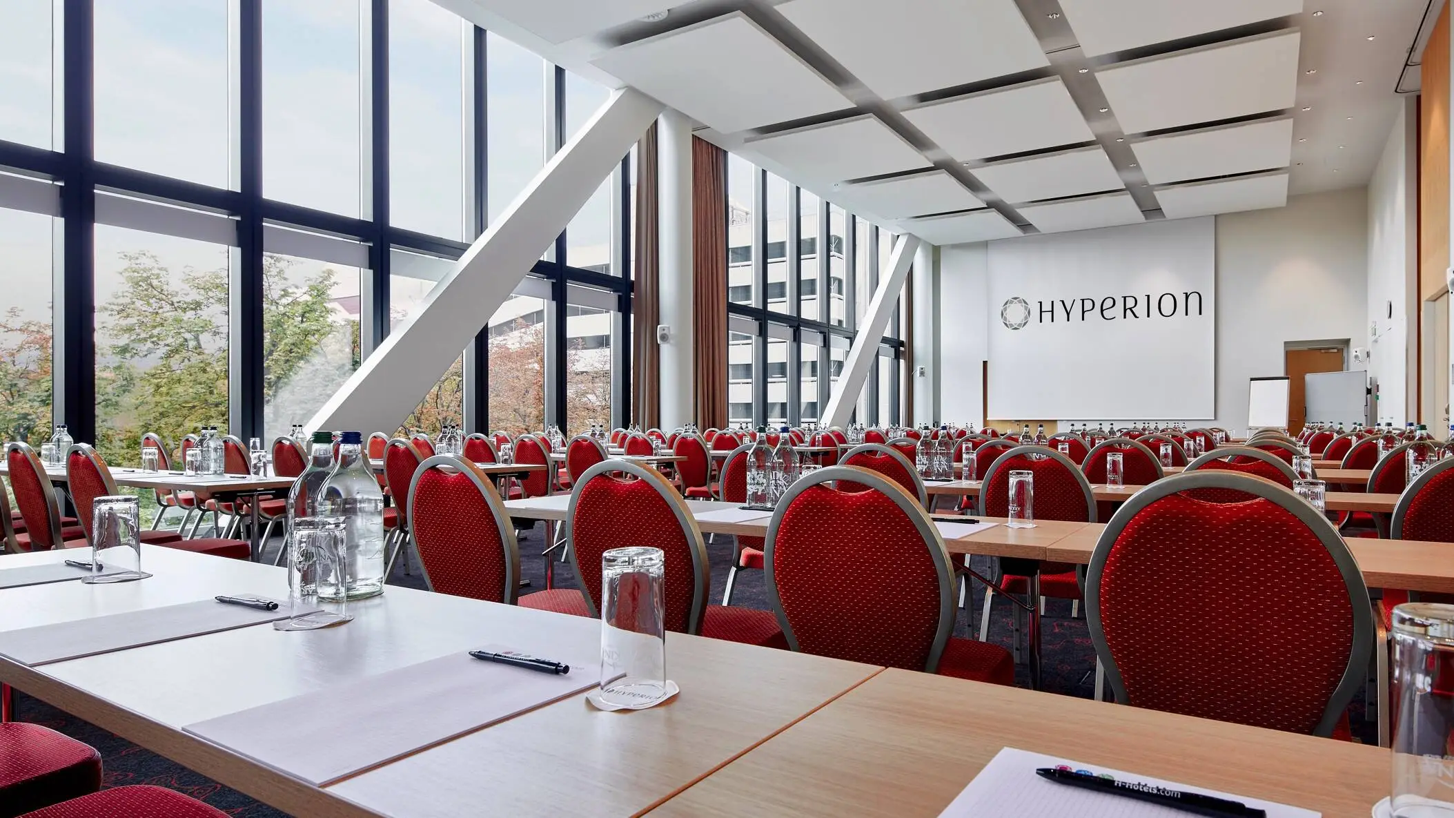 Large conference room with large windows at the HYPERION Hotel Basel.