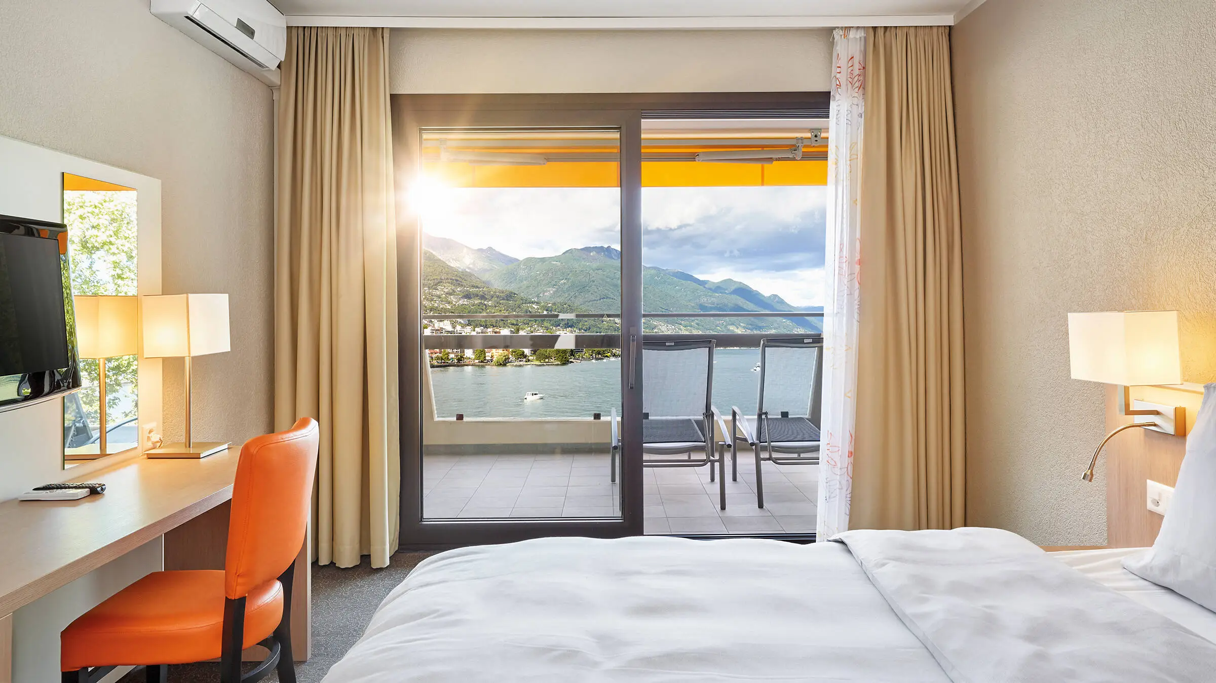 Hotel room with balcony. View of Lake Maggiore from the balcony.