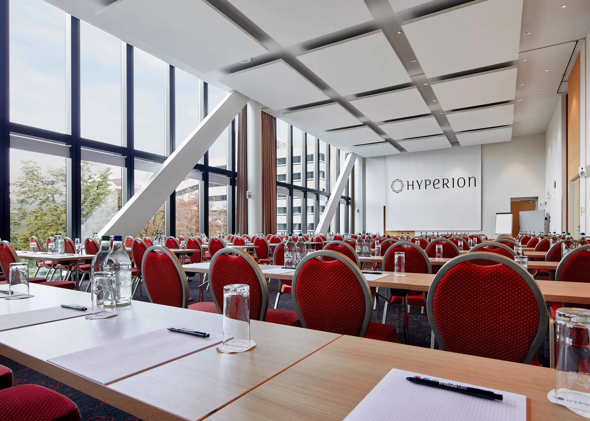 Large conference room with large windows at the HYPERION Hotel Basel.