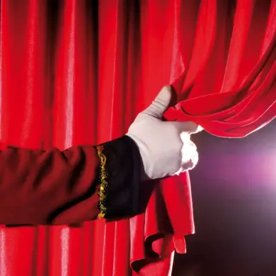 Red curtain is drawn by the director